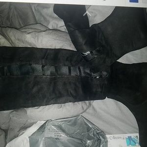 Black and brown knee high boots